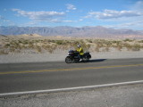Action shot of Jerry and the dunes on the way back to Stovepipe Wells from lunch