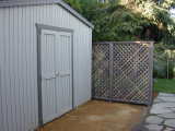 oiled screen fence by shed