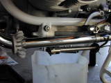 side stand under pipe exhaust